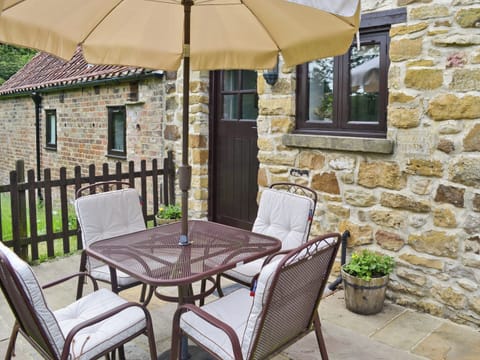 Sitting-out-area | Paper Mill Cottage, Sutton-under-Whitestonecliffe, nr. Thirsk