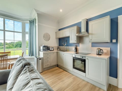 Kitchen area | Silverdale Apartment - Meathop Fell Caravan Club Apartments and Cottage, Meathop, near Grange-over-Sands