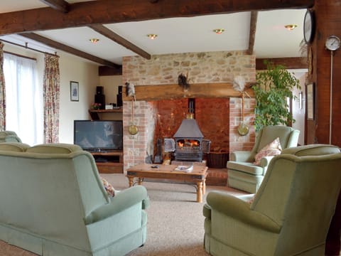 Cosy living area with woodburner | The Granary, Colyford, near Seaton
