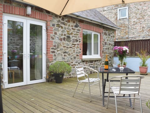 French door access to the decked patio area | Llwynbedw, St Dogmaels, near Cardigan
