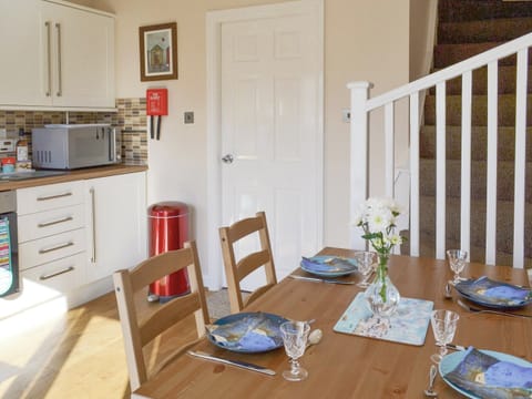 Convenient dining area and stairs to first floor | Signals Court, Scarborough