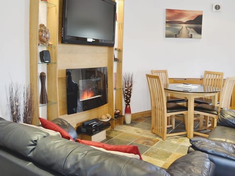 Living room/dining room | Melin Newydd Cottages - The Windmill, Tynlon, nr. Rhosneigr