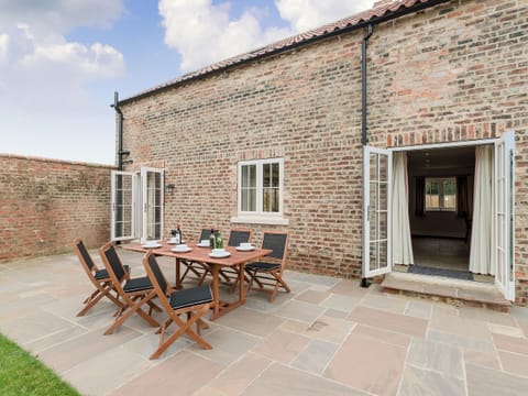 Outside dining area | White Lodge Cottage, Carlton Miniott, near Thirsk