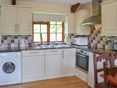 Well-appointed kitchen | Mill Cottage - Trimstone Manor Cottages, Trimstone, near Woolacombe
