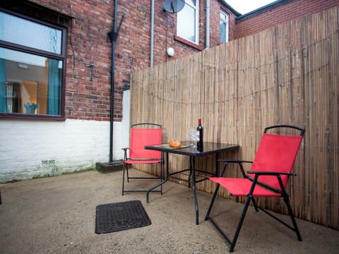 Enclosed yard with garden furniture | Freville Cottage, Shildon, near Bishop Auckland