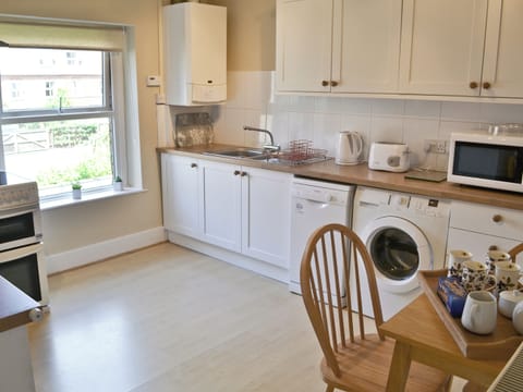 Kitchen with small dining area | Seasands, Sheringham