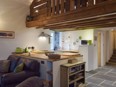 Living space with an impressive vaulted beamed ceiling | Ravens Roost - Upper Farm Barns, Mathry, near St Davids