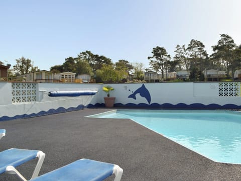 On-site swimming pool | Sea View, Tranquillity - Dinas Country Club, Dinas, near Fishguard