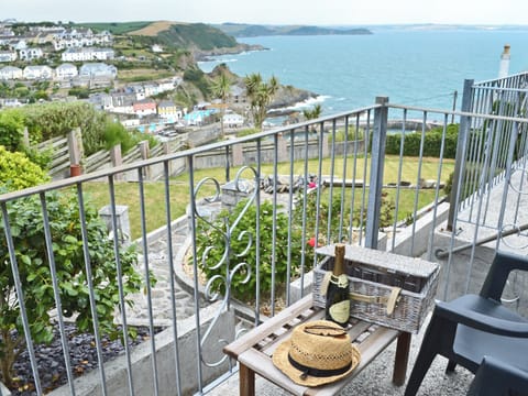 Realxing patio with amazing coastal views | Lowenna - Polhaun Holiday Apartments, Mevagissey, near St Austell