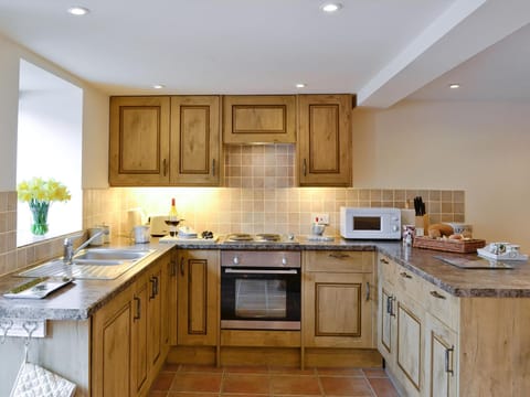 Well-equipped fitted kitchen | Honey Cottage - Bramble Cottage and Honey Cottage, Newland, near Coleford