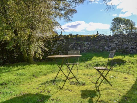 Sunny sitting out area in the garden | Birkerthwaite Barn - Birkerthwaite Cottages, Eskdale
