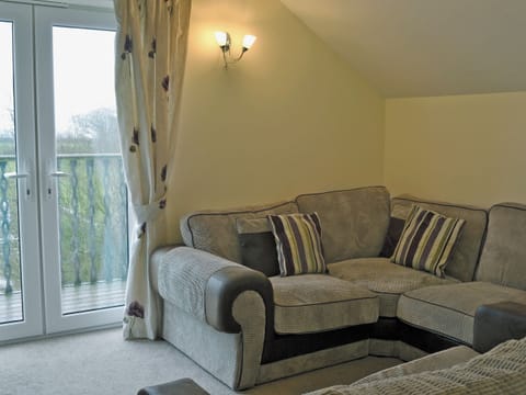 Cosy open plan living/dining room/kitchen with french doors | Birch Lodge - Copper Penny Apartments, Chipshop, near Tavistock