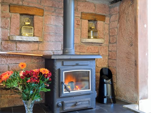 Cosy living area with multi-fuel burner | 1710 - The Seventeen Ten Cottages, Greenwell, near Brampton