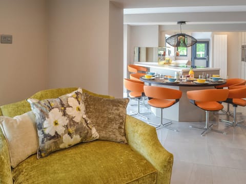 Warm and welcoming living room | Tan Y Fford, Glyngarth, near Beaumaris