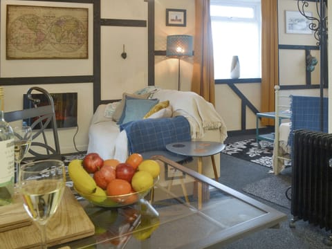 Characterful open-plan living space | The Snug - Ty Copr, Pen-y-Sarn, near Amlwch