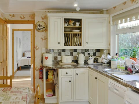 The lovely fitted kitchen and modern appliances | Bryn Rodyn, Graigfechan, near Ruthin