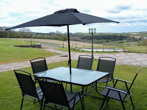 Delightful sitting out area with wonderful views | Bridge House - Lower North Radworthy Cottages, Heasley Mill, near South Molton