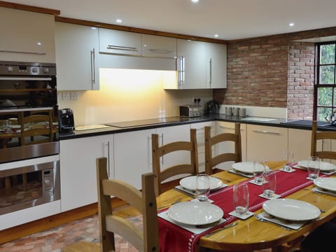 Kitchen and dining area | Bridge House - Lower North Radworthy Cottages, Heasley Mill, near South Molton