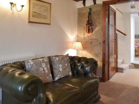 Cosy living room with wood burner | Wild Flower Cottage, Youlgreave, near Bakewell