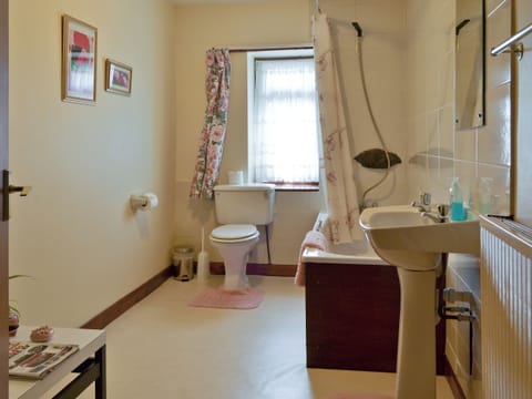 Family bathroom with shower over bath | Bellegrove Cottage, Watermillock, Ullswater