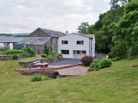 Gardens and property viewed from rear | Bellegrove Cottage, Watermillock, Ullswater
