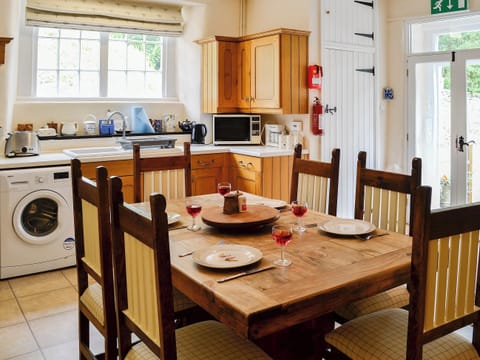 Delightful kitchen/diner with double doors to the decked area | Crogen Wing, Bala