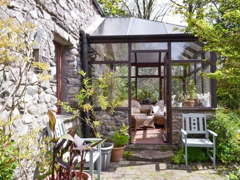 Paved patio with outdoor furniture | The Coach House, Bootle, near Millom