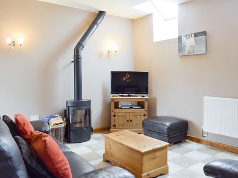 Welcoming living room with modern wood burner | The Granary - Cefnllaethdre, Glynarthen, near Cardigan