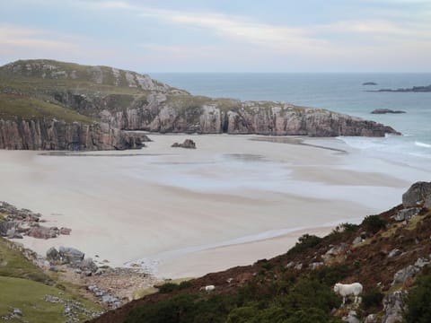 The wonderful white sand and azure seas of the Ceannabeinne beach are just a short stroll away