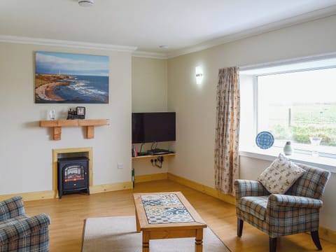 Bright and inviting living room | Sheaf Dale, Portmahomack, near Tain