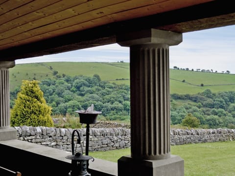 Covered stone veranda with fantastic views | Broadmeadows Farm, Butterton