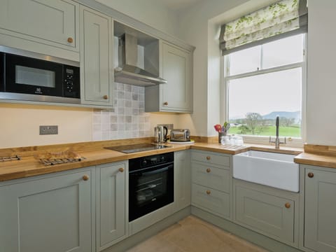 Well equipped kitchen area | The Gatehouse at Beckfoot Hall, Kirkby Stephen, near Appleby