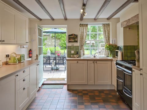 Well-equipped country-style kitchen | Cherry Tree Cottage, Bellerby, Wensleydale