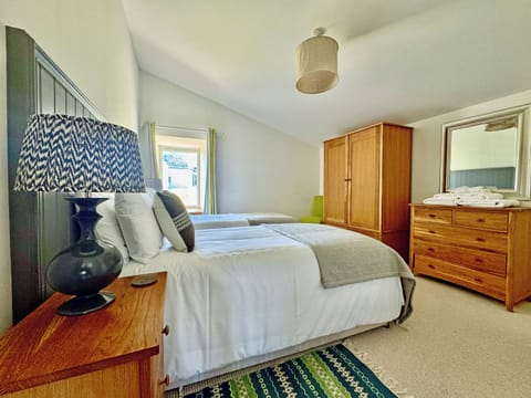 The ground floor has two bedrooms, each with a zip and link Superking and ensuite shower rooms | The Fish House - Rispond Estate, Rispond, near Durness