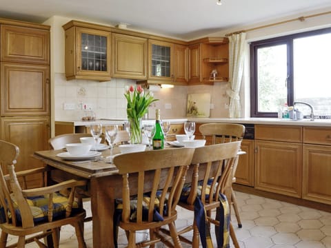Well-equipped kitchen with dining areas | Three Views Bungalow, Talgarth, near Hay-on-Wye