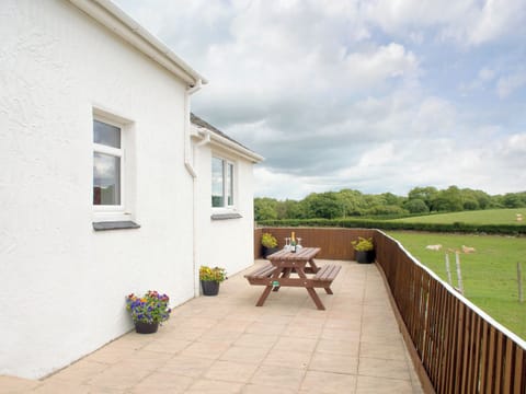 Enclosed patio area with outstanding rural views | Y Ddol, Pontrug, near Caernarfon