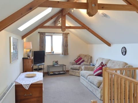 Spacious open plan living space woth vaulted beamed ceilings | Saundrys Barn, Port Isaac