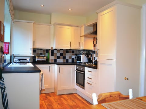Kitchen | Riverbank Cottage, Keswick