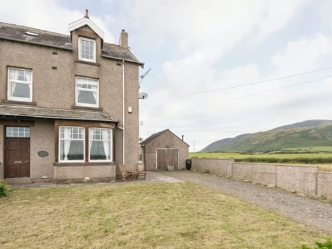 Lawned garden and off road parking | Hartrees House, Silecroft