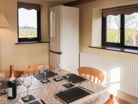 Lovely dining area with views over the surrounding countryside | The Pump House, Hawkesbury Upton