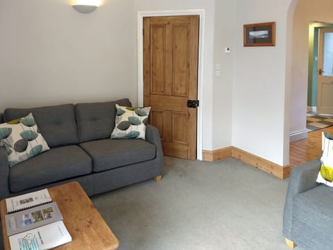 Comfy seating within living room | Glenmore Cottage, Ambleside