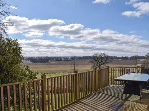 Wonderful views over the surrounding countryside from the decking | Lime Tree Cottage - Inzievar, Oakley, near Dunfermline