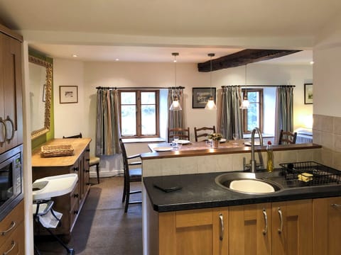 Splendid kitchen overlooking the dining area | Little Knott, Blawith, near Coniston
