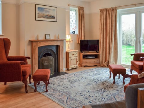 Lovely living room with patio doors to garden | The Glade, Ferring, Worthing