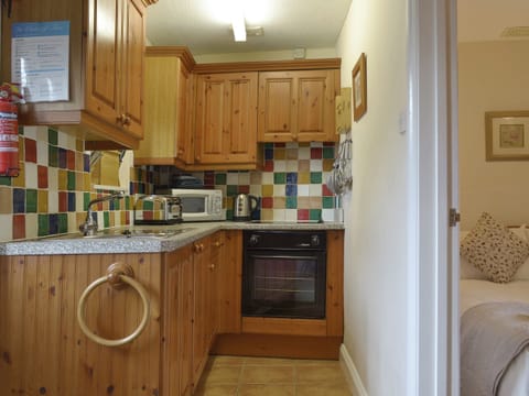 Well-equipped fitted kitchen | Ross Cottage - St Leonards, Polson, nr. Launceston