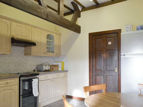 Informal dining area within kitchen | Grove Sprightly Barn, Craven Arms