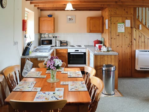 Lovely country-style dining area | Merlin View - Higher Lanvean Farm, St Mawgan, near Newquay