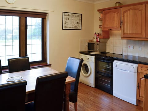 Modest kitchen with breakfast area | Canon Court Farmhouse, Milborne Port, near Sherborne