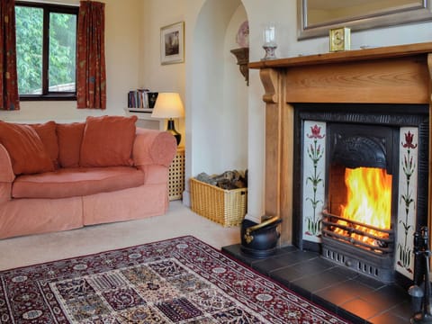 Cosy living room with open fireplace | Bramble Cottage, Meigle