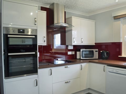 Tastefully modernised kitchen | Tall Pines, Carrbridge